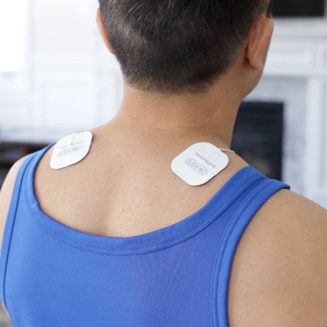 Système de traitement de la douleur TENS à 2 pads